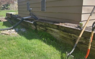 Wall of railroad ties